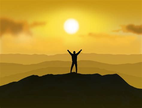 A person standing on top of a mountain with their arms raised in triumph.