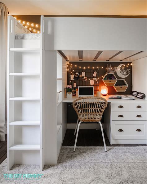 A bedroom with a loft bed and built-in desk