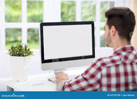 A person looking at a computer screen