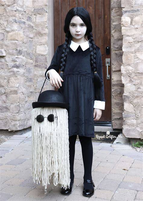 Bring Out the Spooky Fun This Halloween with DIY Addams Family Costumes: Stirring Up Eerie Excitement for the Whole Family!