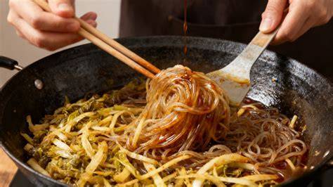 Adding the noodles