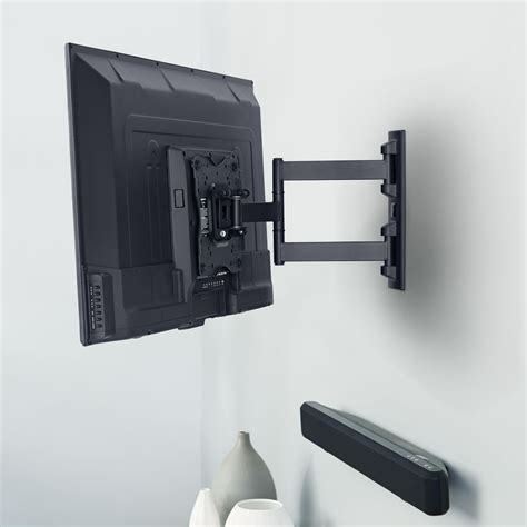 Just a tip, use adhesive tape to attach to a wall mounted Tv, the closer the play bar is to the