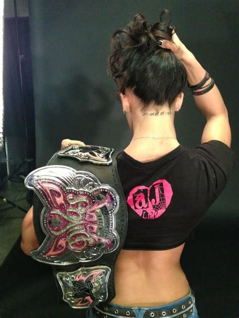 AJ Lee's tattoo tribute to her Divas Championship win AJ