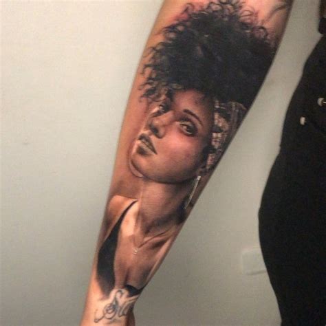 Discover the Meaning Behind Alicia Keys' Intriguing Tattoos!