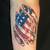 American Flag Ripped Skin Tattoo