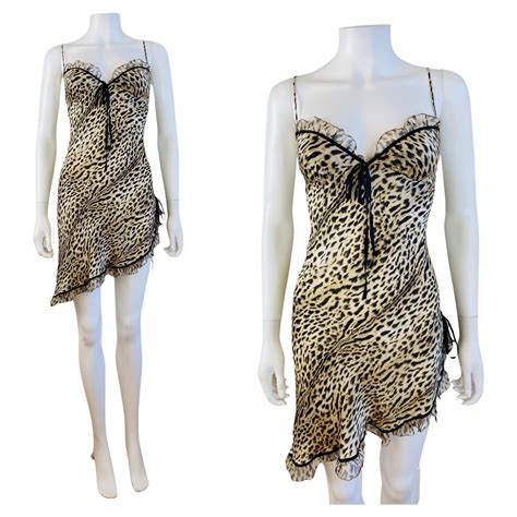 Unleash Your Wild Side with our Trendy Animal Print Slip Dress - Perfect for Any Occasion!