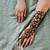 Applying Henna Tattoo