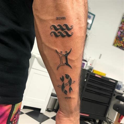 Aquarius Tattoos For Males