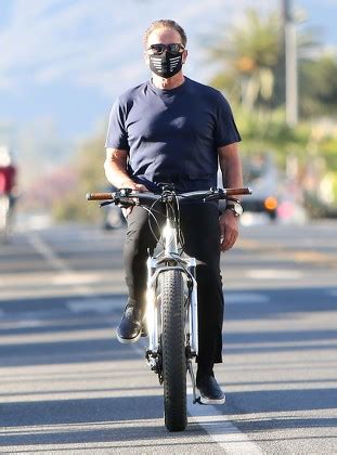 Arnold Schwarzenegger Riding Bike