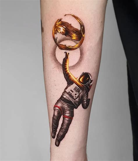 Astronaut Reaching Tattoo