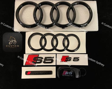 Unleash the Stealthy Elegance with Audi S5 Black Emblems - A Must-Have for Every Luxury Car Enthusiast!