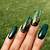 Autumn Opulence: Add a touch of luxury to your nails with dark green shades