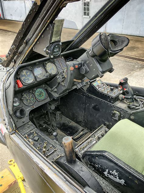 Immerse Yourself in Aviation History: Explore the Intriguing Cockpit of the Legendary BELL AH-1 Cobra