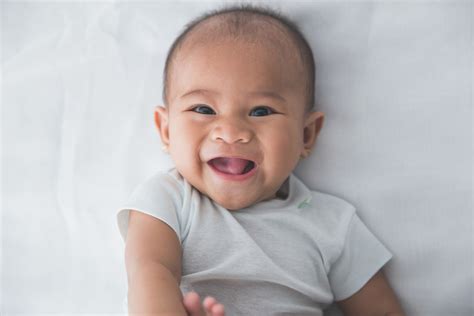 Baby Smiles & Laughs: 2-Month Development Milestones