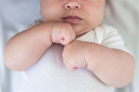 Baby With Fist Clenched