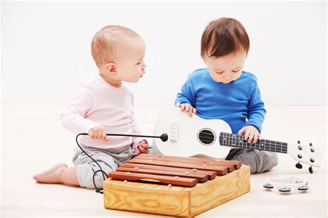 Baby playing with musical instruments