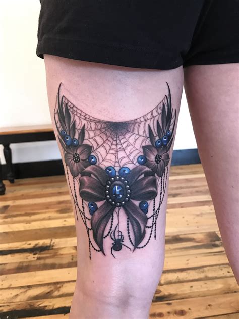Back of thigh tattoo (ow) by Sarah Akers La Tattoo
