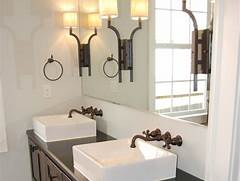 Bathroom with Oil Rubbed Bronze Accessories and Lighting