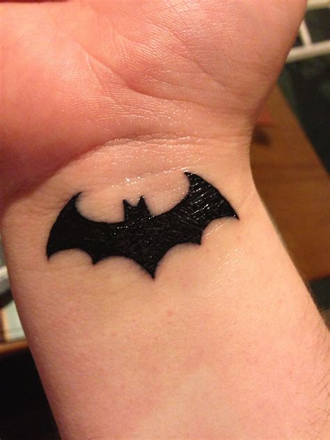 Awesome Batman logo tattoo on wrist