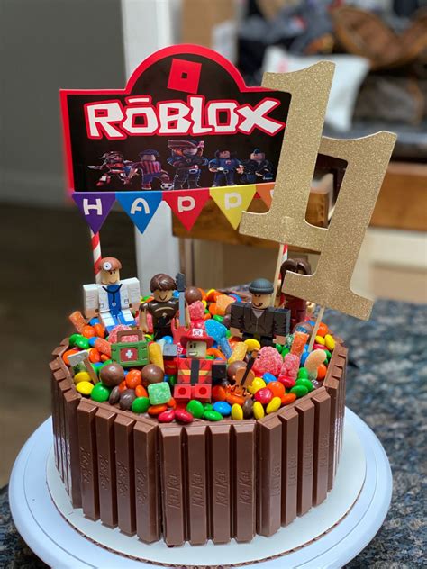 Batman and Ninjago and Roblox cake