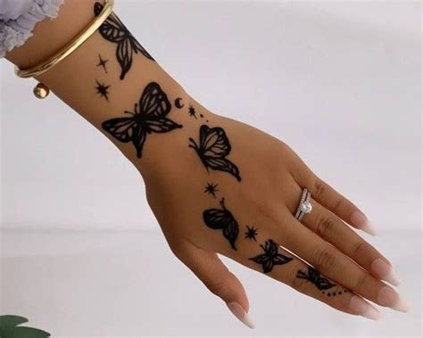 Hand Tattoos for Women 50+ Beautiful Hand Tattoo Designs