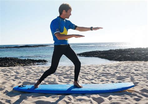 Beginner surfer standing up