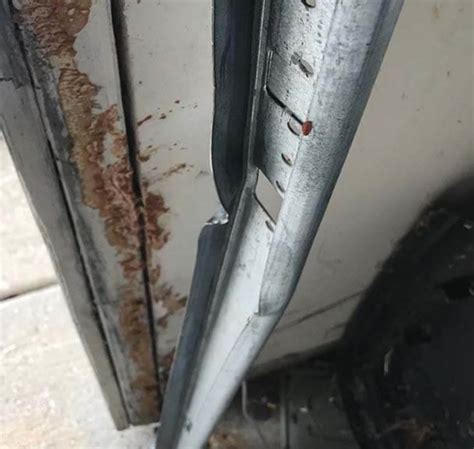 Bent Garage Door Track Repair