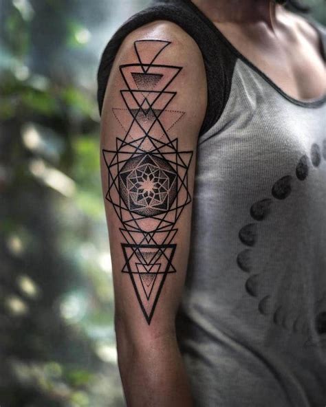 10 Artists Who Create Striking Geometric Tattoos Spanning