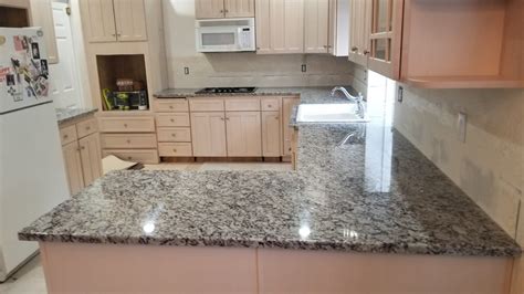 Elevate Your Cooking Experience with Bianco Frost Granite Kitchen: Perfect Blend of Elegance and Functionality.