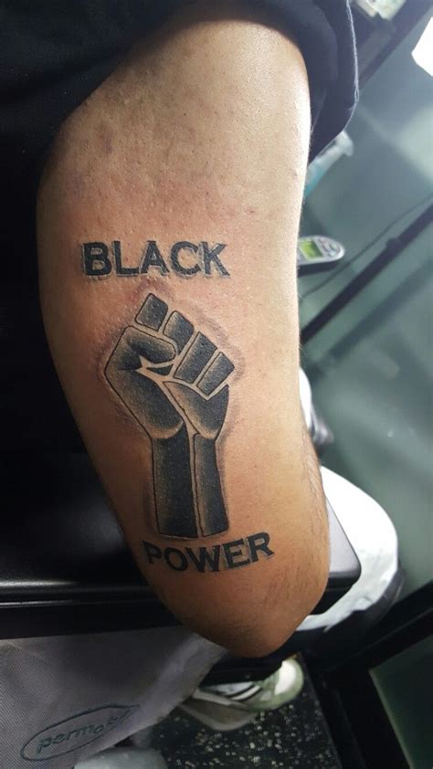 Black power tattoo* 🏿 Silhouette tattoos, Sleeve tattoos