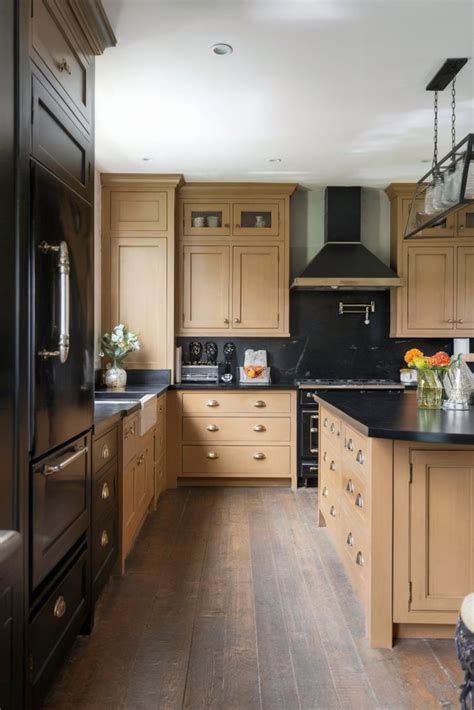 Indulge in Sleek Sophistication with Black and Tan Kitchen Decor: Elevate Your Home Design Game!