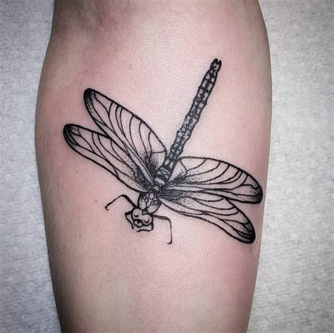 Black dragonfly tattoo Design of TattoosDesign of Tattoos