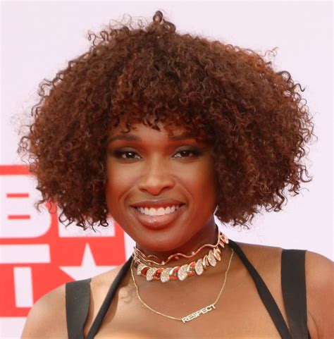 Black Female Singer With Curly Hair