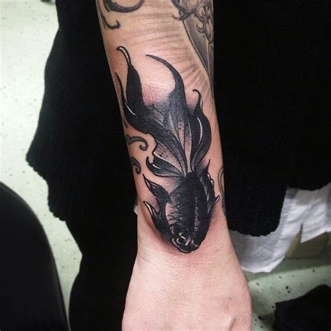 Black koi fish tattoo on half sleeve for girls