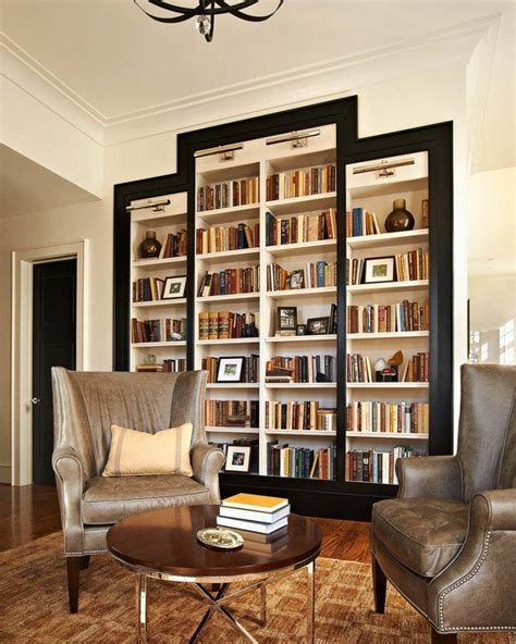 Black and white bookshelves in bedroom