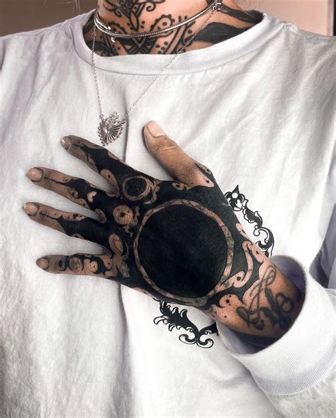 Blackout Hand Tattoo