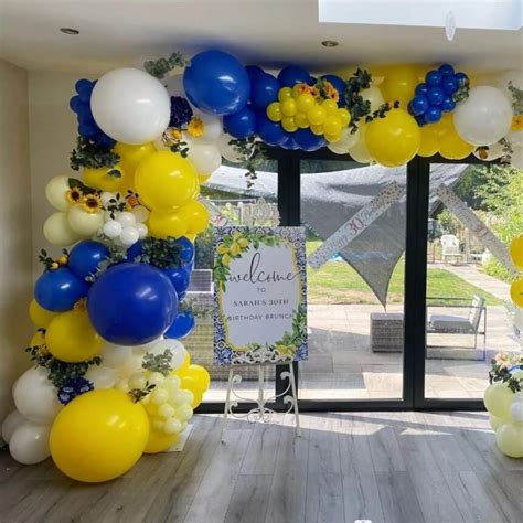 Let's Soar to New Heights with Exquisite Blue and Yellow Balloon Decorations: Elevate Your Event with Stunning Color Schemes