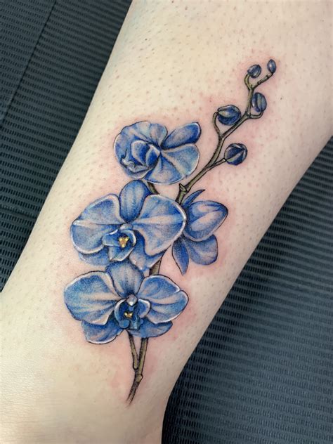 Flower tattoo , blue orchid tattoo Blue orchid tattoo