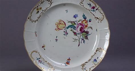 Nymphenburg Teller, Durchbruchrand, Blumendekor, goldstaffiert, um 1900