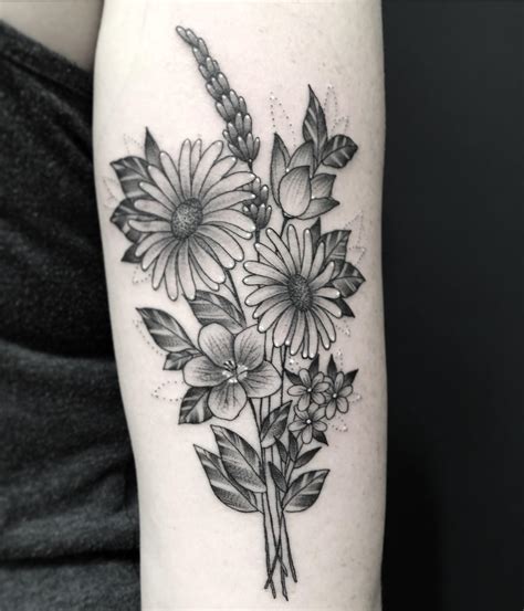 Colorful and hyperrealistic tattoo of a flower bouquet