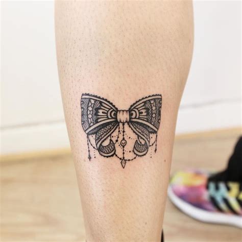 bow tattoos on back of legs meaning Tattoosonback