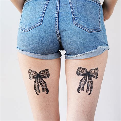 Bow Back Of Leg Tattoo