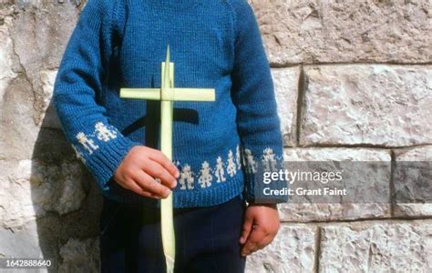 Boy Holding Cross