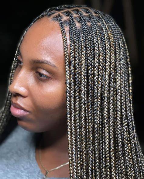 Empower Your Beauty: The Ultimate Guide to Choosing the Perfect Braid Color for Radiant Dark Skin