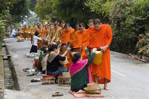 Buddhist monks receiving alms
