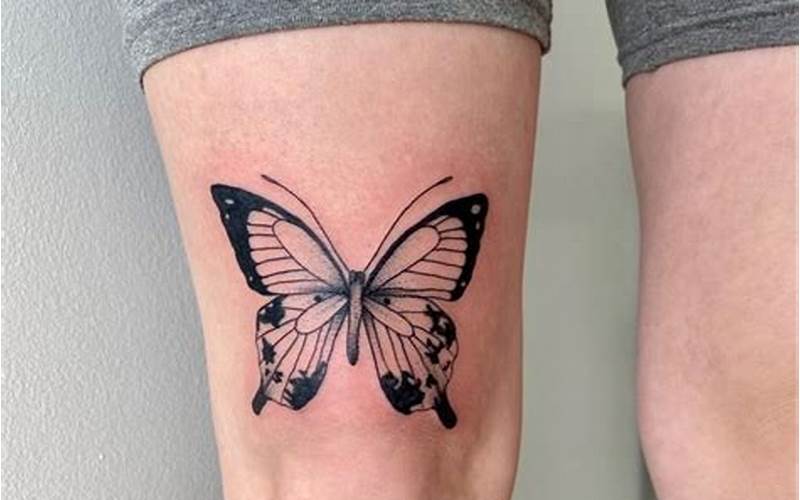 Butterfly Tattoo Above Knee