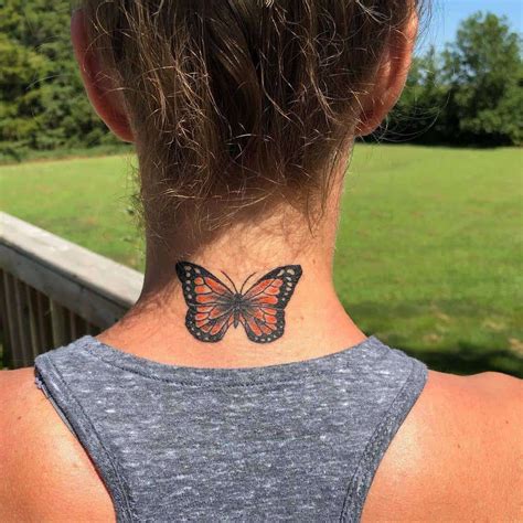 Butterfly Tattoo On Back Of Neck