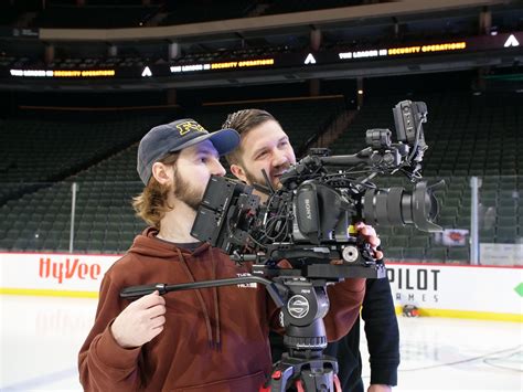 Camera Operator Collaborating with Director of Photography