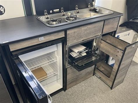 Camping in Style: Experience Ultimate Convenience with the Camper Kitchen Pod Featuring a Fridge