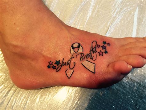 Cancer Ribbon Tattoos Designs Ideas to Give Support to the